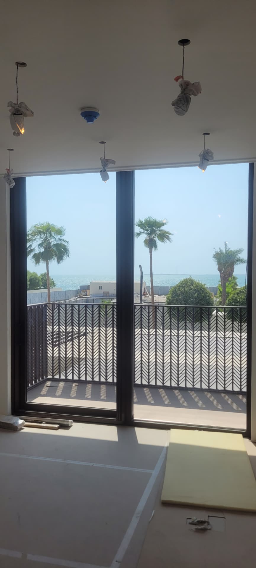Sea-facing villa interior after installation of a concealed fresh-air and humidity-control system.